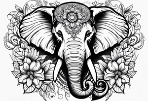 elephant face with flowers tattoo idea