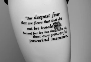 the quote is “ Our deepest fear is not that we are inadequate, Our deepest fear is that we are powerful beyond measure” intertwined with meaningful basketball jerseys or events tattoo idea