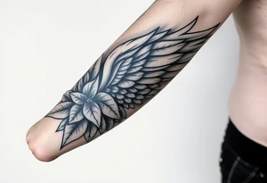 Forearm sleeve tattoo including details of a few jungle leafs, Puerto Rican tribal patterns, angel wing with money patterns in it tattoo idea