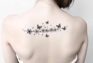 Flowers down the spine surrounded by small butterflies and sparkles tattoo idea
