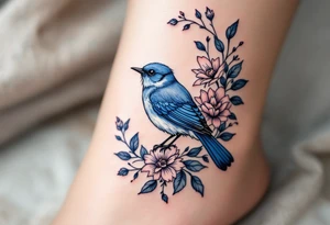 Blue bird in a floral frame tattoo idea