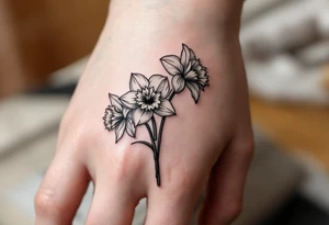 narcissus flowers, daffodils and holly. tattoo idea