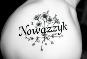 The word Nowaczyk surrounded by three flowers with  vines running through it 
on the lower tricep, medium size tattoo idea