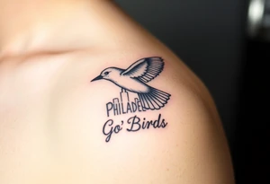 Philadelphia Classic bird flying over Philadelphia city skyline with Go Birds written under it tattoo idea