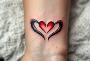 Two half-heart tattoos in black with red tips that form a full heart when partner shoulders are side by side tattoo idea