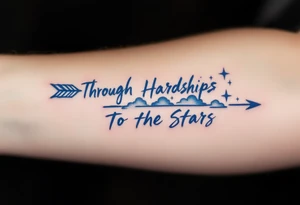 Scrawled in ink that fades from cobalt to silver, the quote “Through Hardships To the Stars” runs under an arrow piercing the clouds skyward. tattoo idea