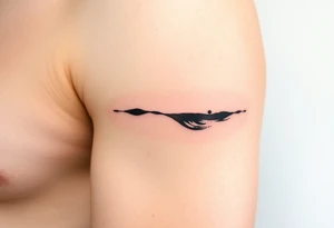 A delicate ink-wash-style mole, in traditional Japanese sumi-e brushstrokes with soft black and gray tones tattoo idea