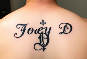 The words Joey D written with a large scale fancy J at the start tattoo idea