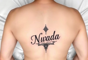 a woman's waist with the word "Nwada" written on her waist make her sit on the bed tattoo idea
