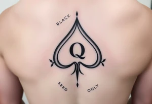 A spade womb tattoo with a Q in the center, with three points around the outside. The first reading, "BLACK". The second reading, "SEED". The third reading, "ONLY". tattoo idea