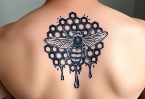 steampunk design of honeycomb with bee and dripping honey tattoo idea
