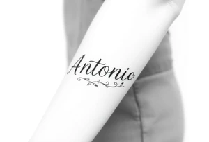 Make me a tattoo design with my husbands name Antonio stacking tattoo idea