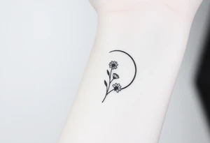 Small black and white tattoo waxing crescent moon with small Daisy birth flower and tiny leo gliph tattoo idea