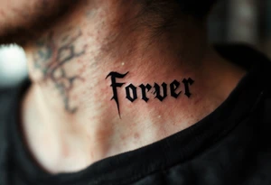 A small, black ink "forever" on the wrist, enclosed by a fine-line infinity symbol. tattoo idea