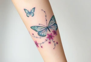 ethereal butterflies with flowing silk ribbons with vines of flowers tattoo idea