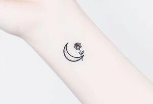 Small black and white tattoo waning crescent moon with small rose birth flower AND tiny Gemini gliph tattoo idea