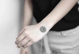 Fibonacci spiral shell sun tattoo idea