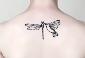 Dragonfly flying around along
 with a hummingbird tattoo idea