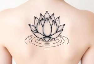 serene lotus flower emerging from sacred waters with ripples tattoo idea