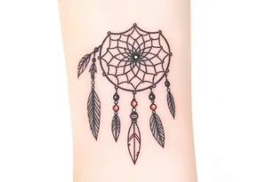 native dreamcatcher with flowing feathers and sacred beads tattoo idea