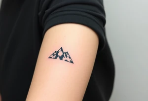 A pair of minimalist black and blue mountain peaks, one tattooed on the one´s forearm and the matching smaller version on the cother tattoo idea