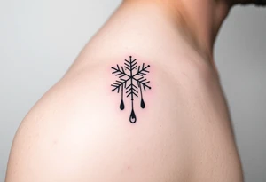 A snowflake melting and turning into rain drops tattoo idea