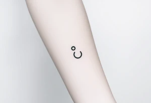 A small ";" symbol tattoo idea