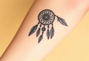 native dreamcatcher with flowing feathers and sacred beads tattoo idea
