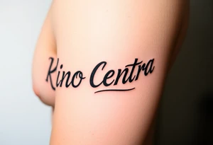Forearm tattoo with the words kino central tattoo idea
