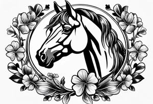 horse shoe with 5 leaf clover inside tattoo idea