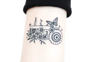 A small feminine tractor with flowers and butterfly tattoo idea