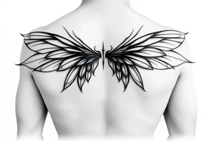 Long wispy fairy wings folded closed down full back tattoo idea