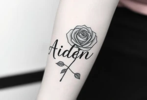 The name Aiden Infront of a rose tattoo idea