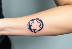 A yin-yang symbol with two dolphins circling each other, representing balance and harmony tattoo idea