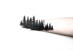 Coniferous forest silhouette around the forearm a tattoo tattoo idea