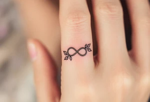 A rose ring with a small infinity symbol tattoo idea