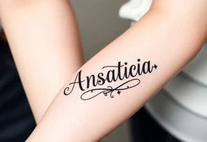 Anastacia in old English font tattoo idea