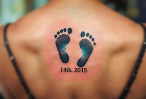Baby footprints in black ink with the child’s birth date in soft blue or pink beneath commemorate a mother’s most treasured moment. tattoo idea