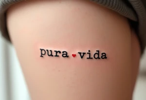 Tiny “Pura Vida” in typewriter font with a single delicate red heart replacing the dot on the “i.” tattoo idea