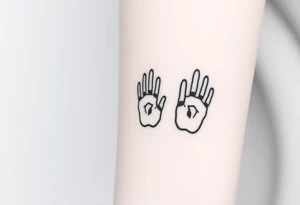 A set of black and white fingerprints tattoo idea