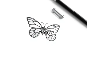 A butterfly with the name “euan” incorporated into it tattoo idea