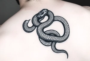 Snake wrapping and going up leg tattoo idea
