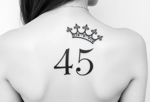 Capital G letter handwritten script with a crown tilted to the left on the front right shoulder on top of a number 45 tattoo idea