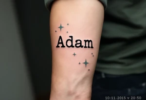 "Adam" written in typewriter font above 10.11.2015 v 20:50, with soft sage green stars around it. tattoo idea
