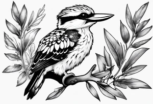 Small kookaburra sitting on wattle leaves tattoo idea