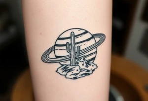 saturn with the rings being a rollercoaster track, and on the land i want the cactus jack cactus, a spider and the yeat UFO, on the forearm tattoo idea