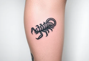 a creepy blackwork centipede tattoo on the inner calf tattoo idea