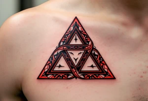 A bold tribal-style triquetra, filled with deep red and black patterns tattoo idea