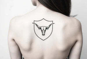 A shield with a longhorn in it tattoo idea