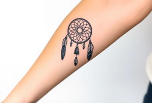 native dreamcatcher with flowing feathers and sacred beads tattoo idea